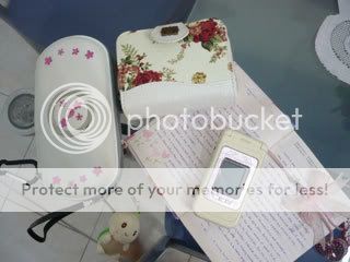 PSP, mobile phone, wallet and diary